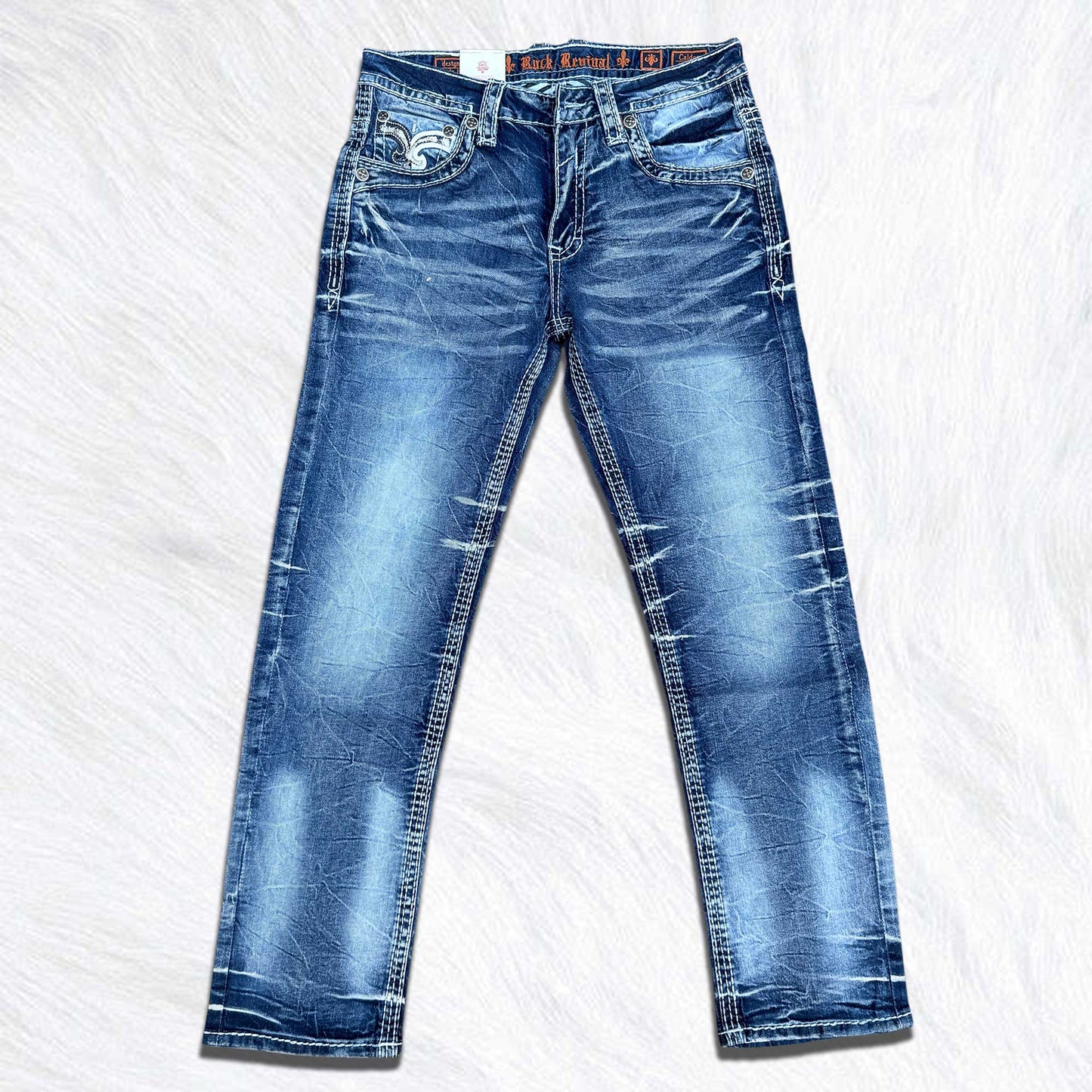 Rock Revival Calden Straight Jeans - Large Fleur de Lis Patch